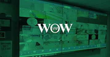 Videowand mit Live-Kamerabildern im Kontrollraum des Sicherheitsdienstes in der portugiesischen World of Wine, verwaltet von der Userful-Plattform, mit grünem Overlay und Logo